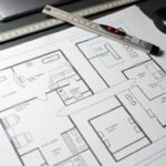 Architectural drawing of basement remodel plans with measurements and layout options