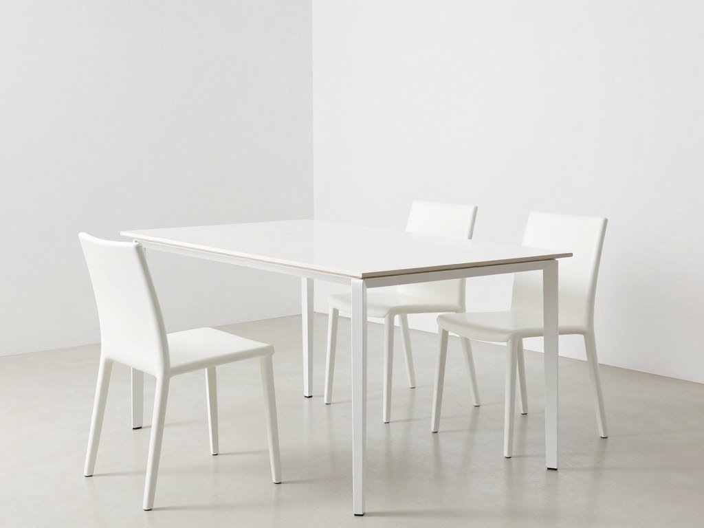 A minimalist modern dining table with sleek lines and monochromatic color scheme