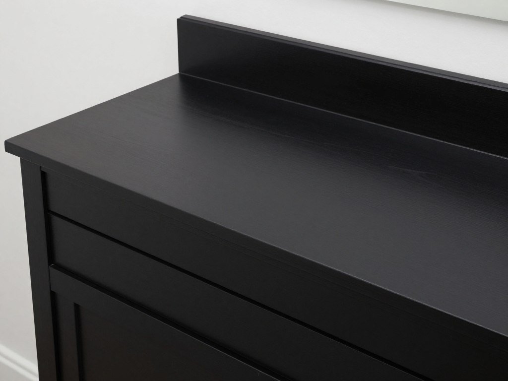 Black painted bathroom vanity with smooth, uniform color