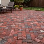 11 Stunning Paver Patio Ideas Backed by Real Amazon Reviews Classic herringbone pattern paver patio with outdoor furniture and potted plants