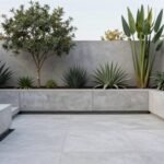 Modern backyard with clean lines, geometric shapes, and minimalist plantings showcasing core principles of contemporary landscape design