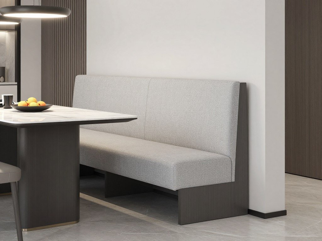 Modern dining banquette bench with clean lines and neutral upholstery