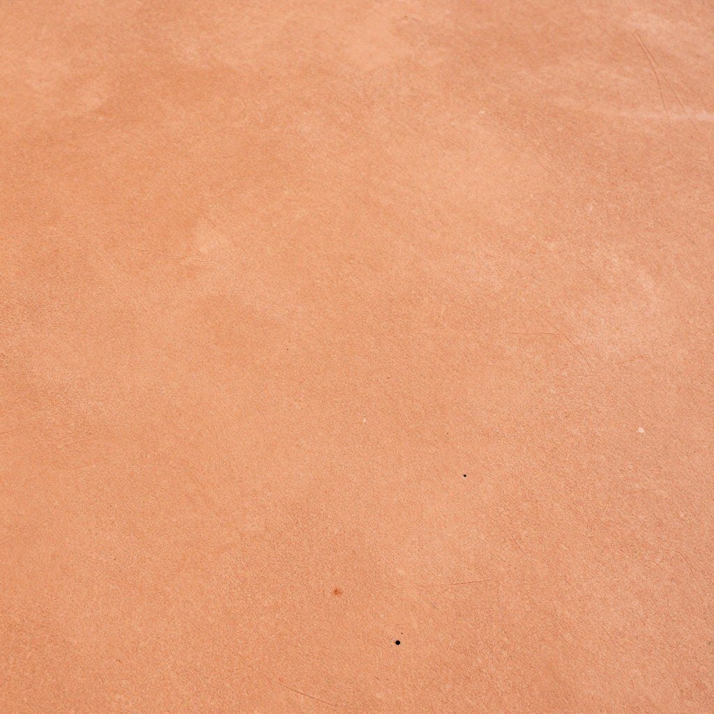 Warm terra cotta colored stamped concrete patio Warm terra cotta colored stamped concrete patio