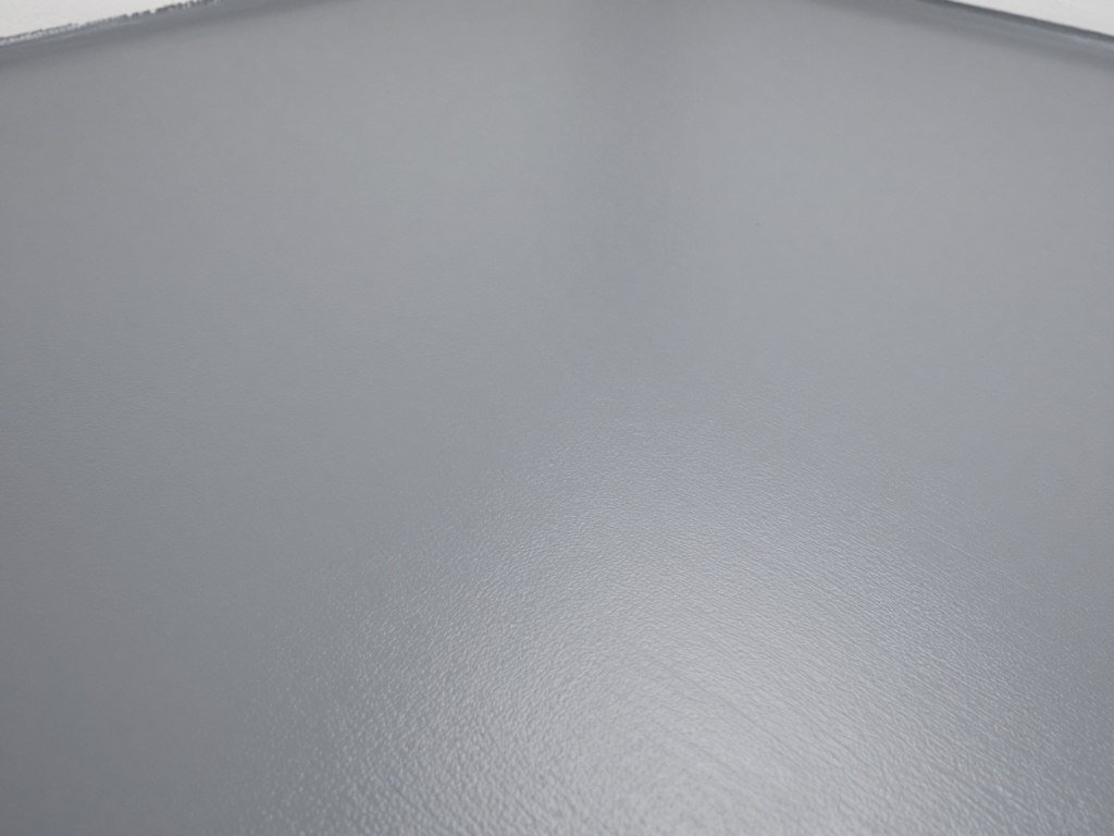 Close-up of latex acrylic painted garage floor showing texture and finish