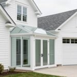 15 Stunning Breezeway Ideas to Garage Enclosed for Your Home Modern enclosed glass breezeway connecting a white house to matching garage