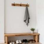 organized entryway storage with coat rack and bench