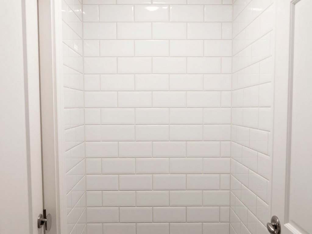 peel and stick tile in narrow laundry room
